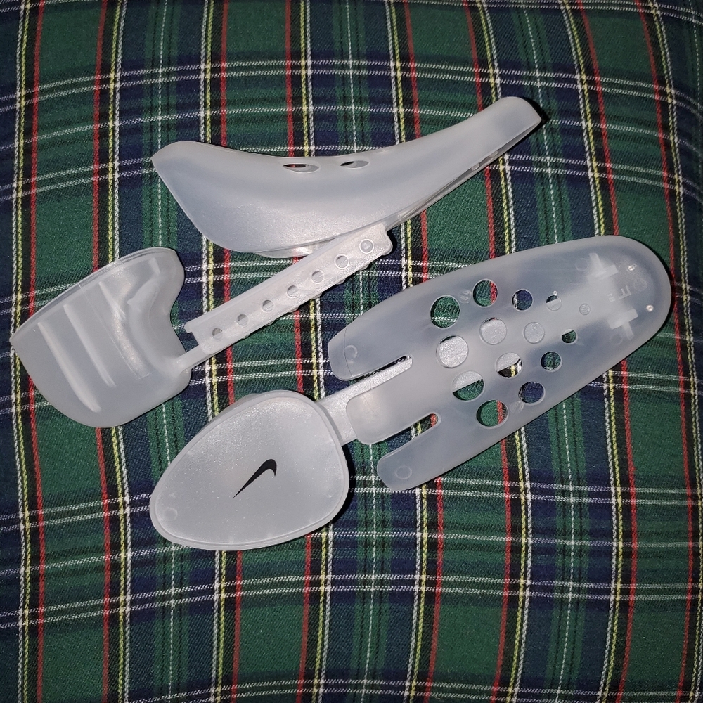 Shoe forms with Nike logo